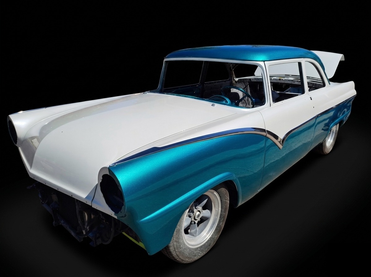 Custom teal and white classic Ford restoration by Reflectionz